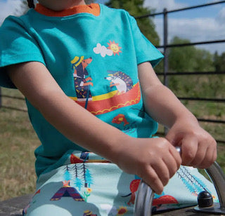 Organic Short Sleeve Turquoise T-shirt with Canoeing Dog and Hedgehog